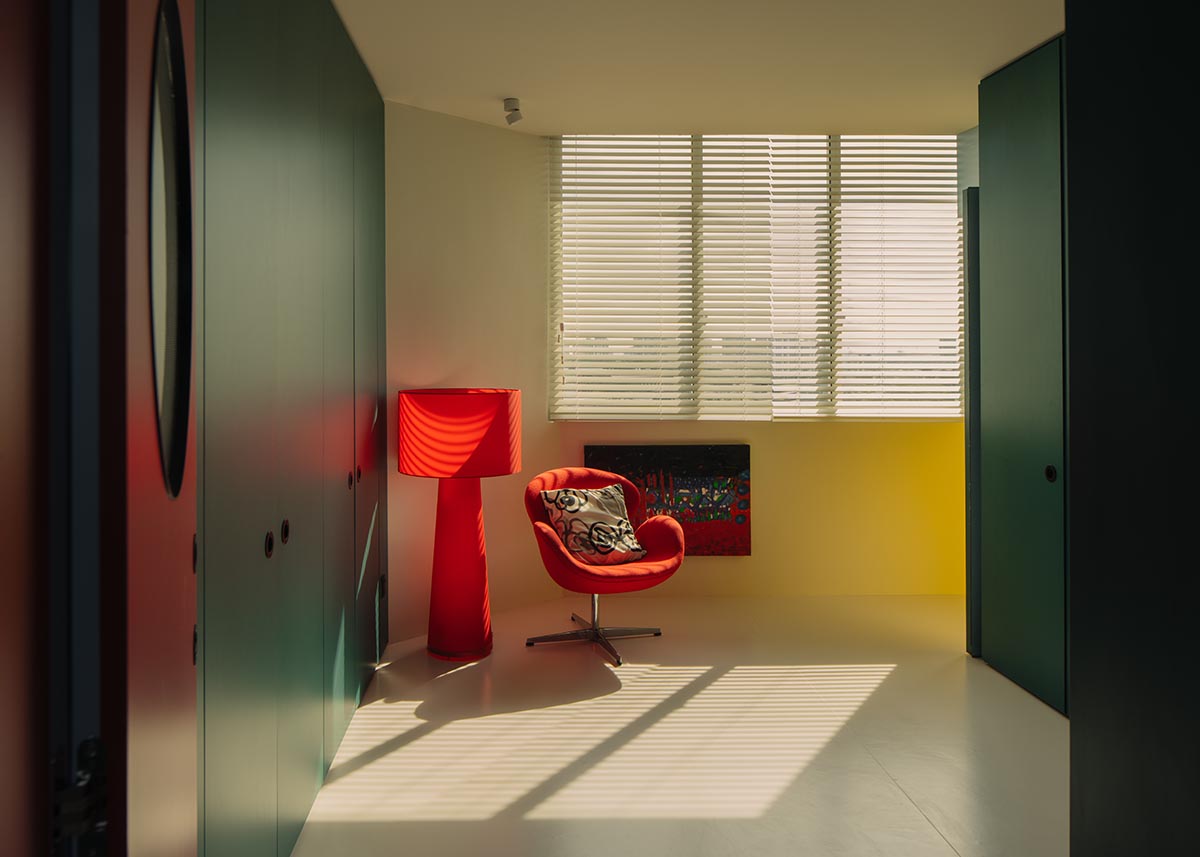 SPARK redesigns brutalist apartment with geometric and colorful objects in Singapore