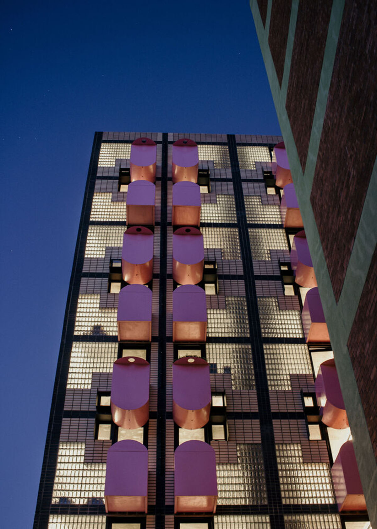 Two Five Five Architects adds protruding bright pink marshmallow balconies to apartment in Cape Town