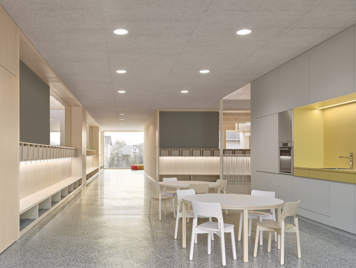 Innauer-Matt Architekten designs kindergarten with large pointed windows and wall motifs in Austria