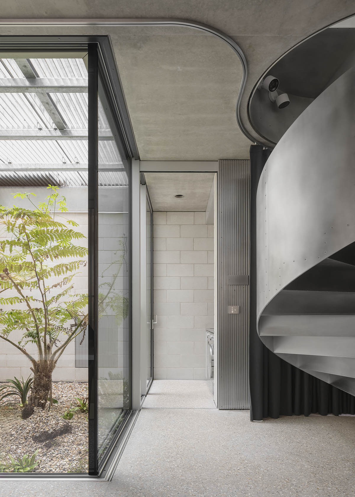 Gianni Botsford Architects expands Norman Foster extension with large-span aluminium-framed glazing