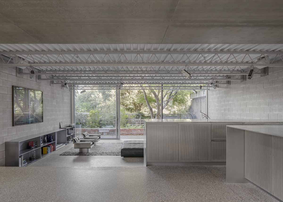 Gianni Botsford Architects expands Norman Foster extension with large-span aluminium-framed glazing