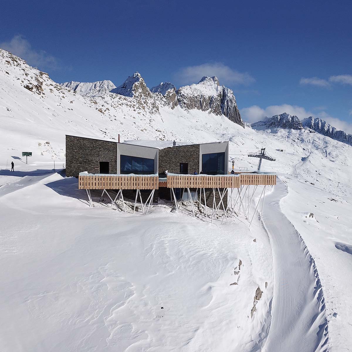 Studio Seilern Architects completes two gourmet restaurants on top of the Swiss Alps