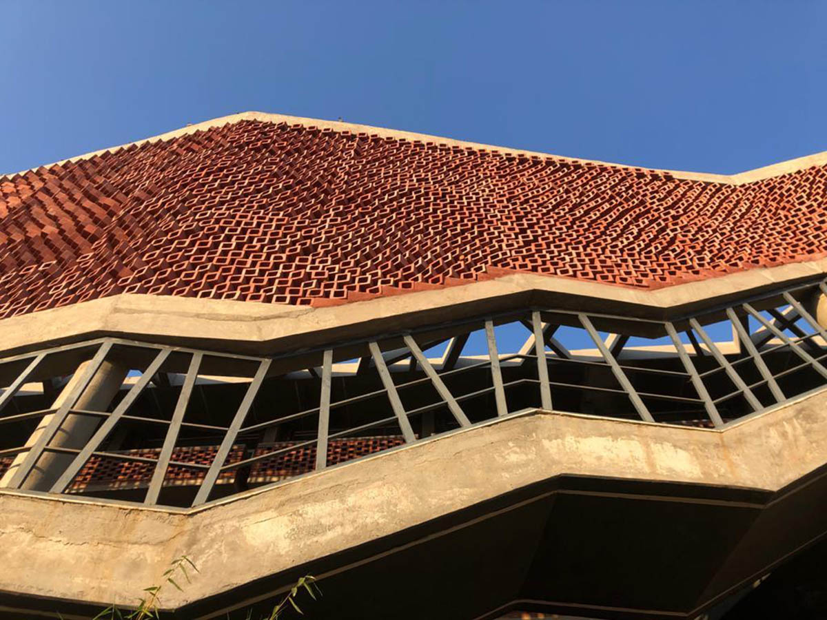 Zero Energy Design Lab built girls' hostel featuring free-standing façade in Gurugram, India