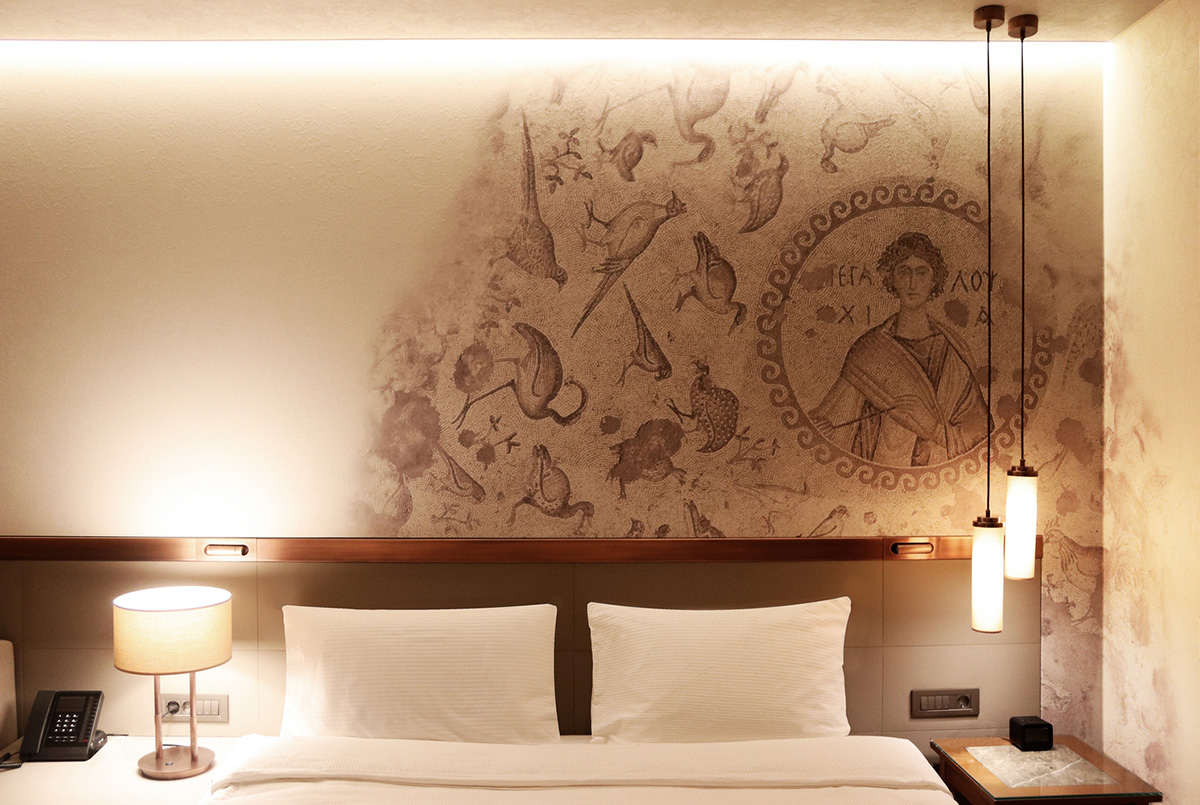 Emre Arolat Architecture preserves archaeological remnants with this modular hotel in Antakya