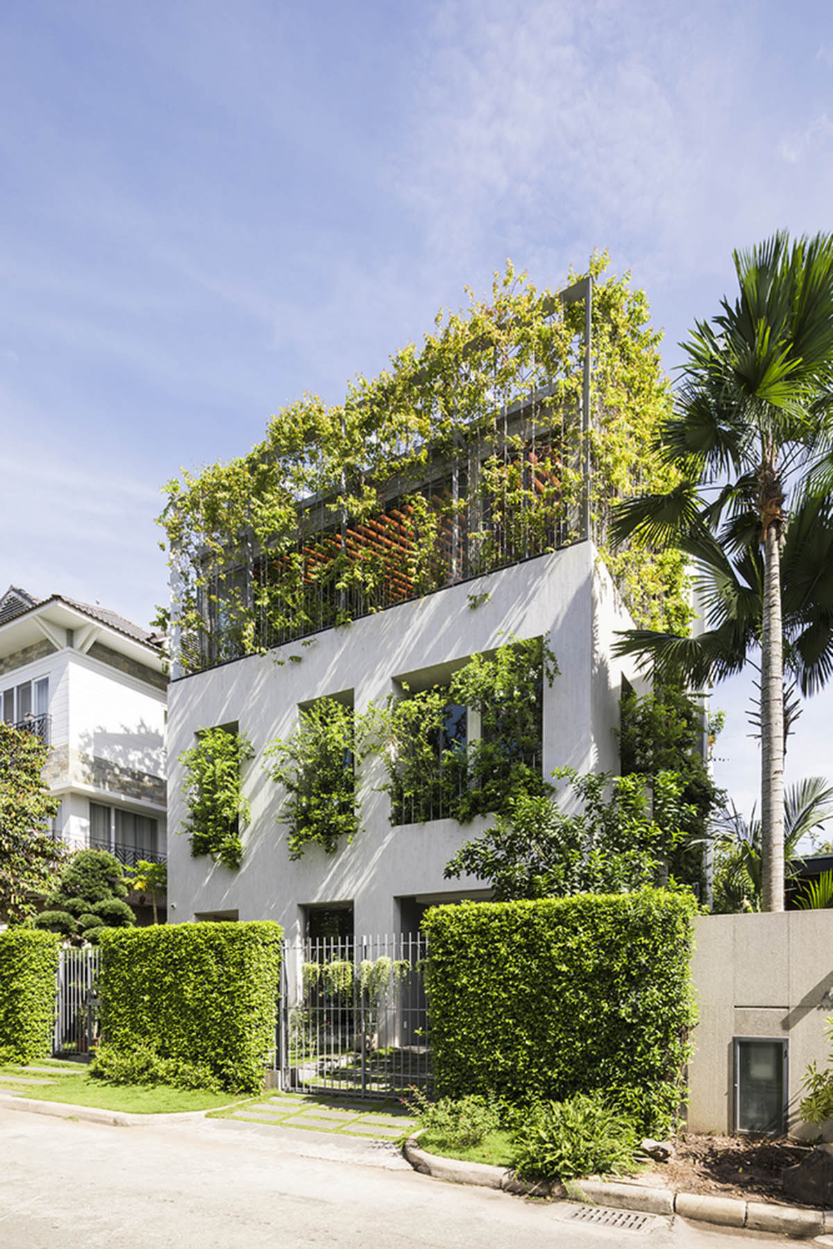 VTN Architects fills Stepping Park House with ivy plants and trees in Ho Chi Minh City