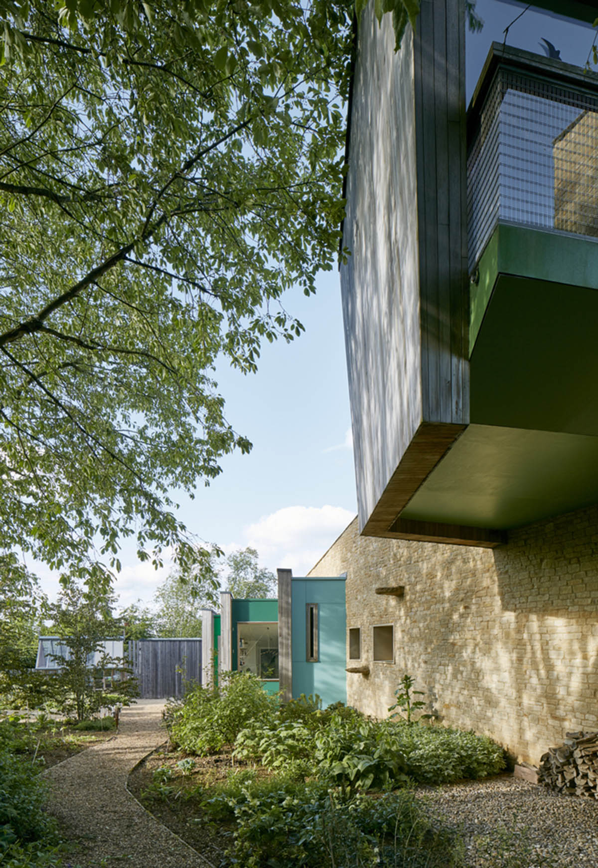 Featherstone Young creates meandering green roof for Stonecrop House in Rutland, UK