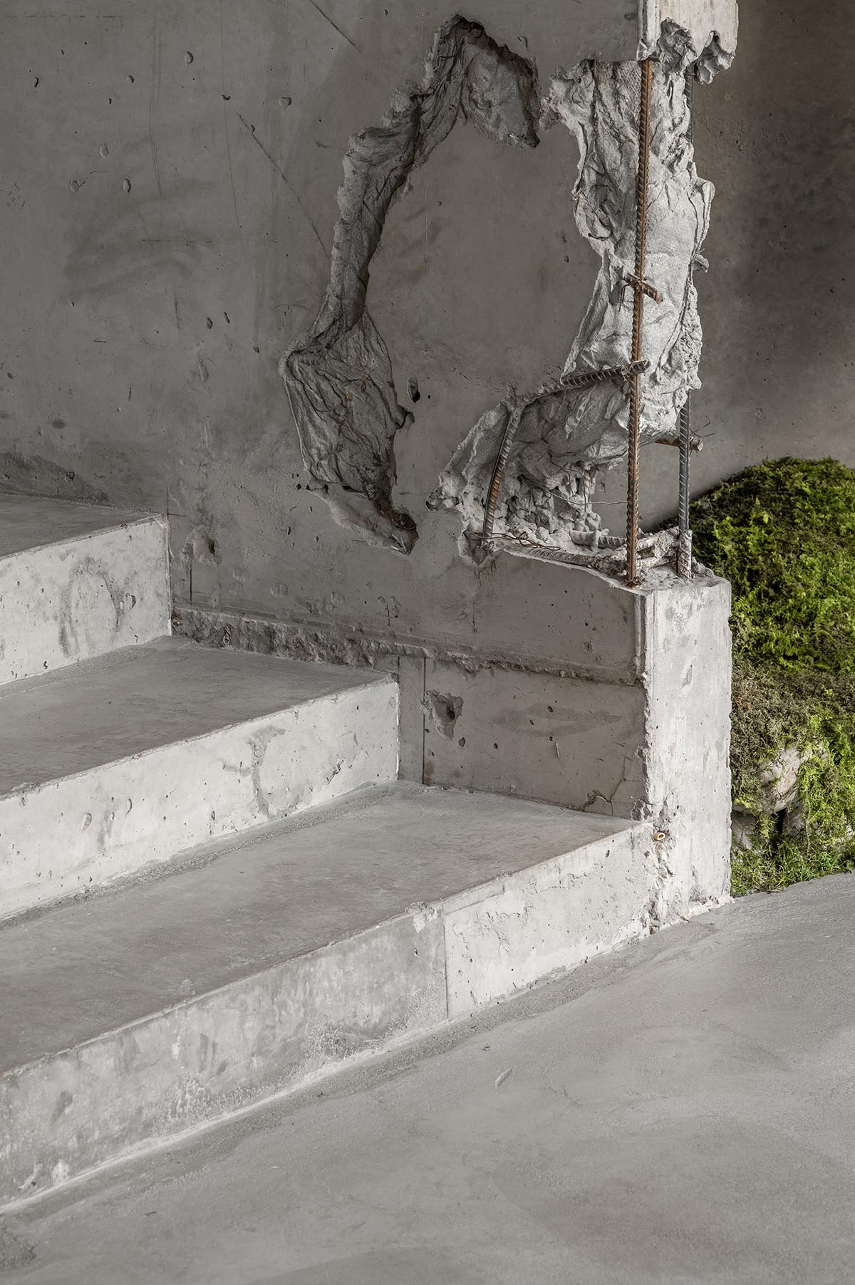 An early 20th-century building is transformed into a raw, industrial-looking interior for Kyiv store 