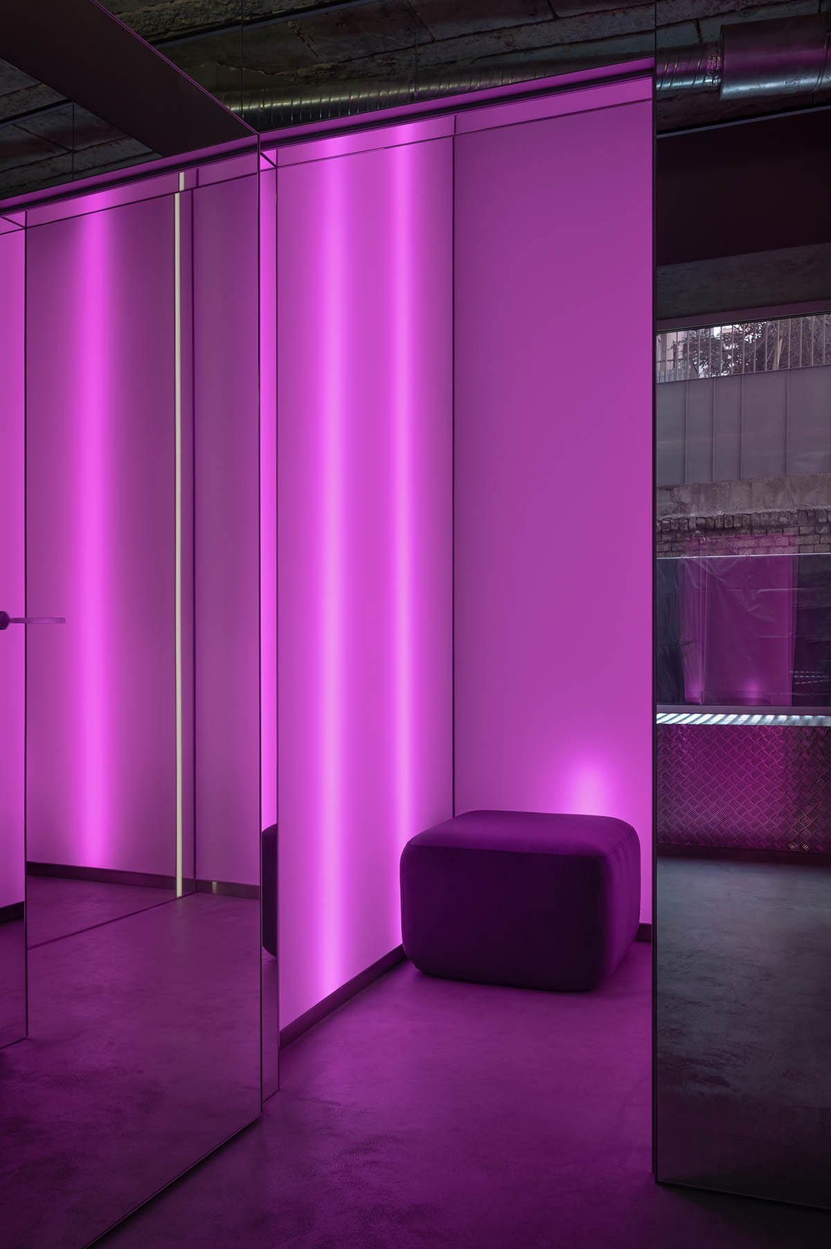 An early 20th-century building is transformed into a raw, industrial-looking interior for Kyiv store 