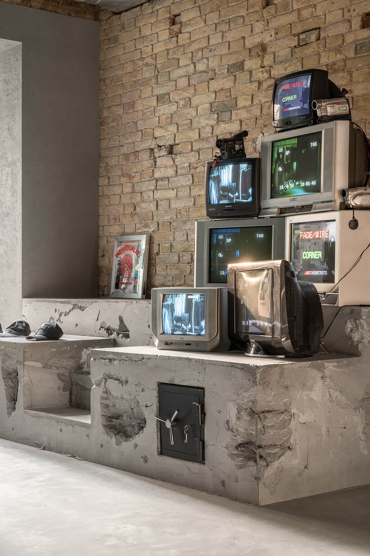 An early 20th-century building is transformed into a raw, industrial-looking interior for Kyiv store 