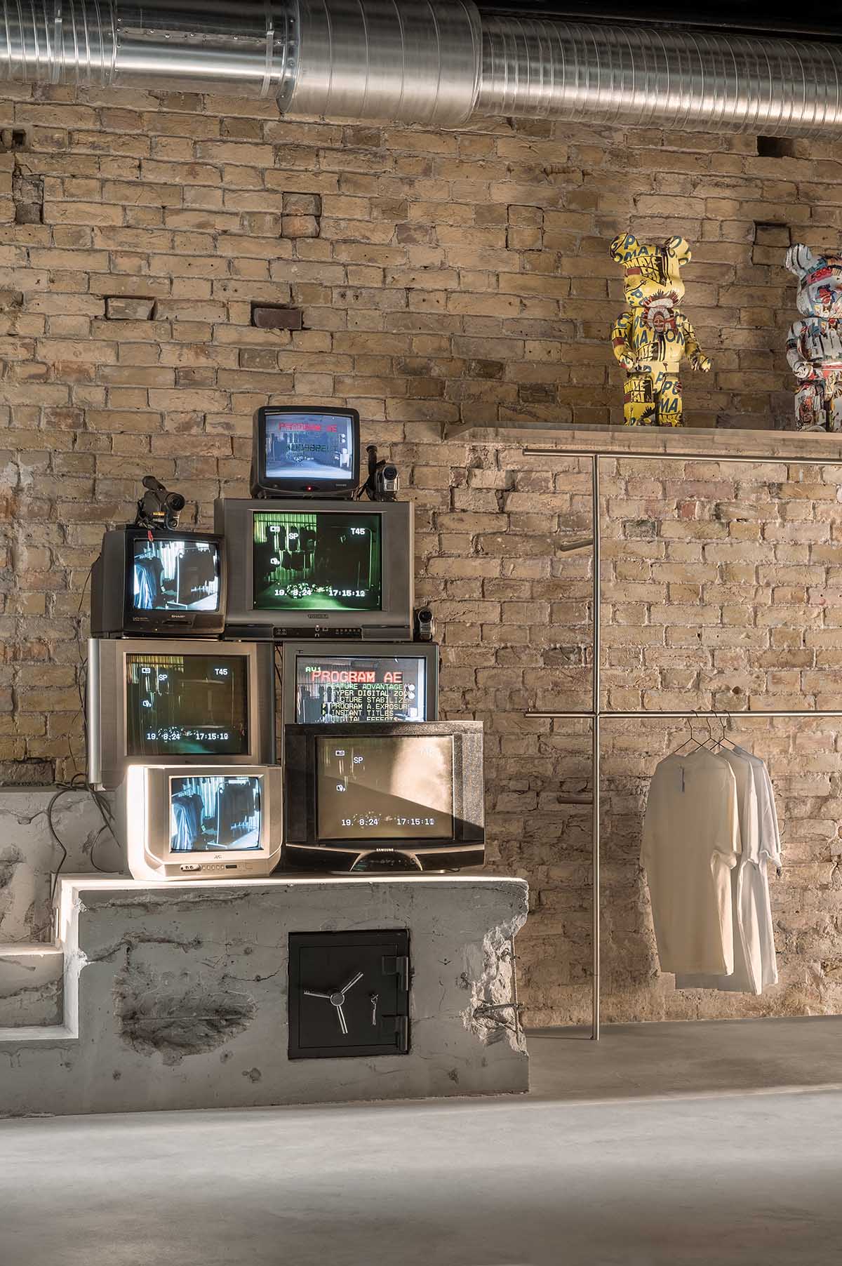 An early 20th-century building is transformed into a raw, industrial-looking interior for Kyiv store 