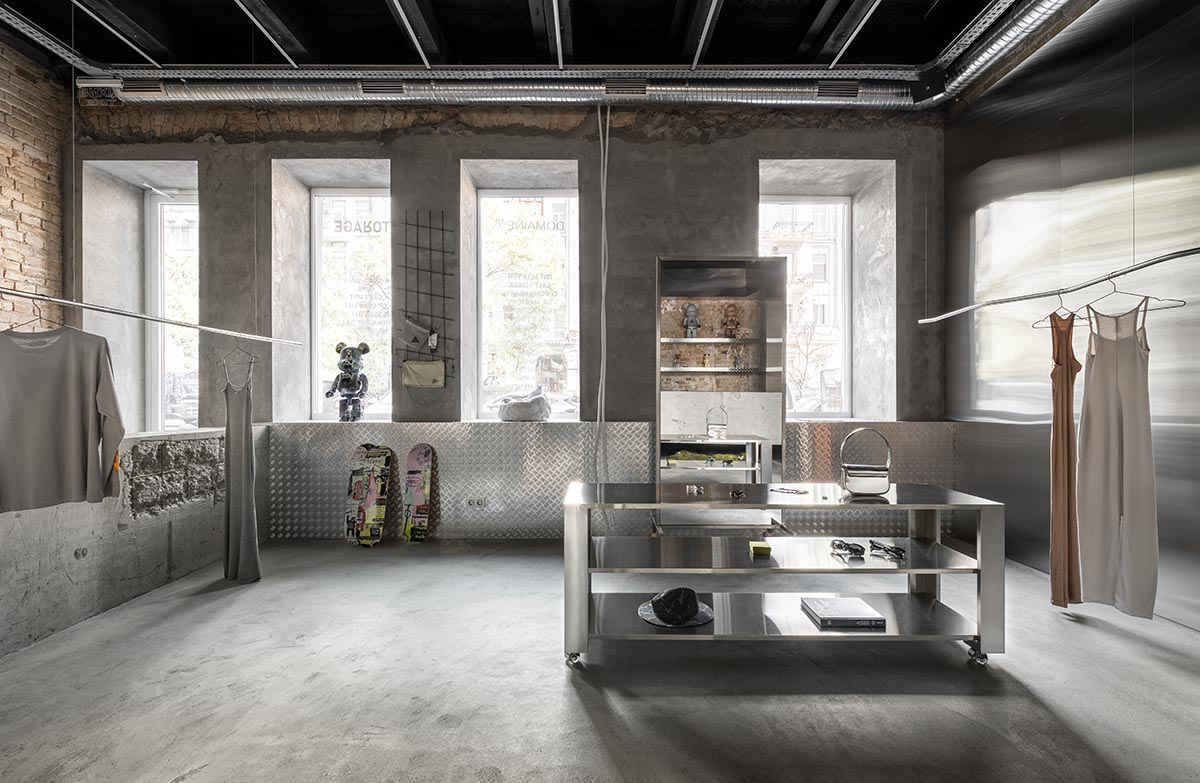 An early 20th-century building is transformed into a raw, industrial-looking interior for Kyiv store 