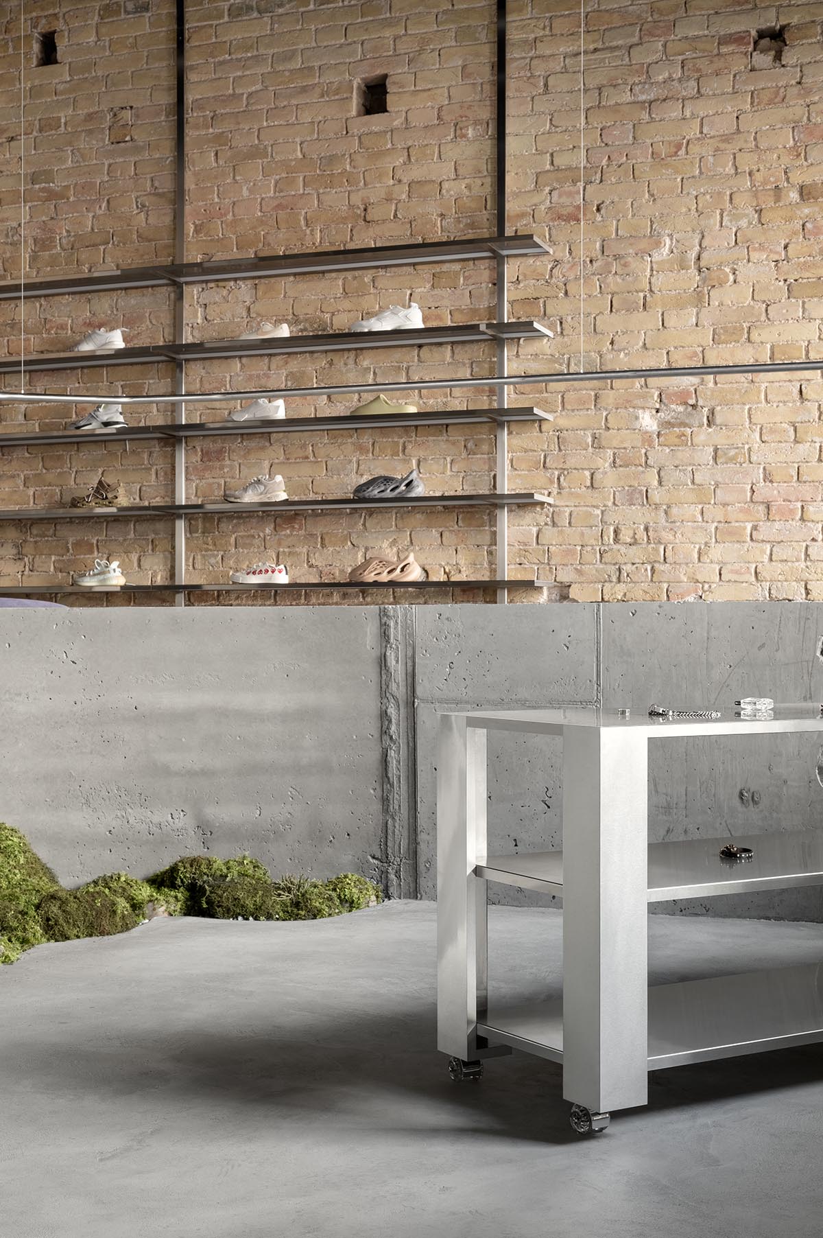 An early 20th-century building is transformed into a raw, industrial-looking interior for Kyiv store 