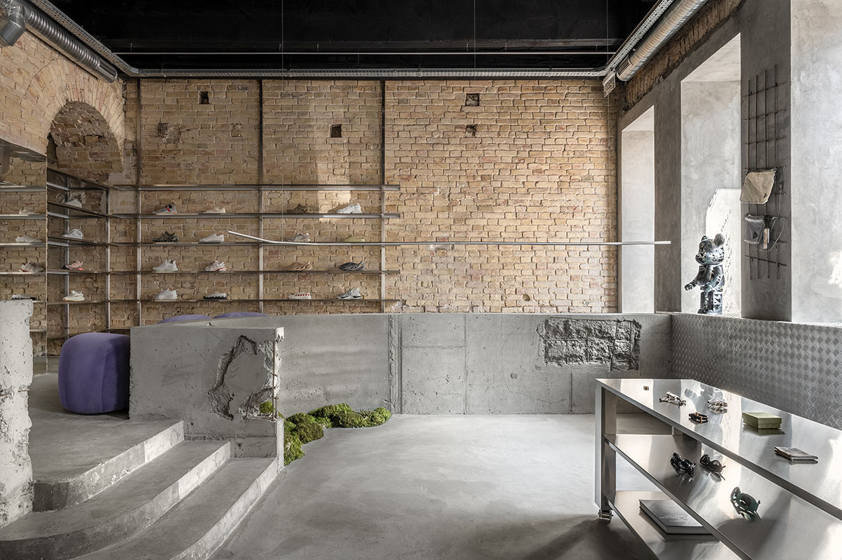 An early 20th-century building is transformed into a raw, industrial-looking interior for Kyiv store 