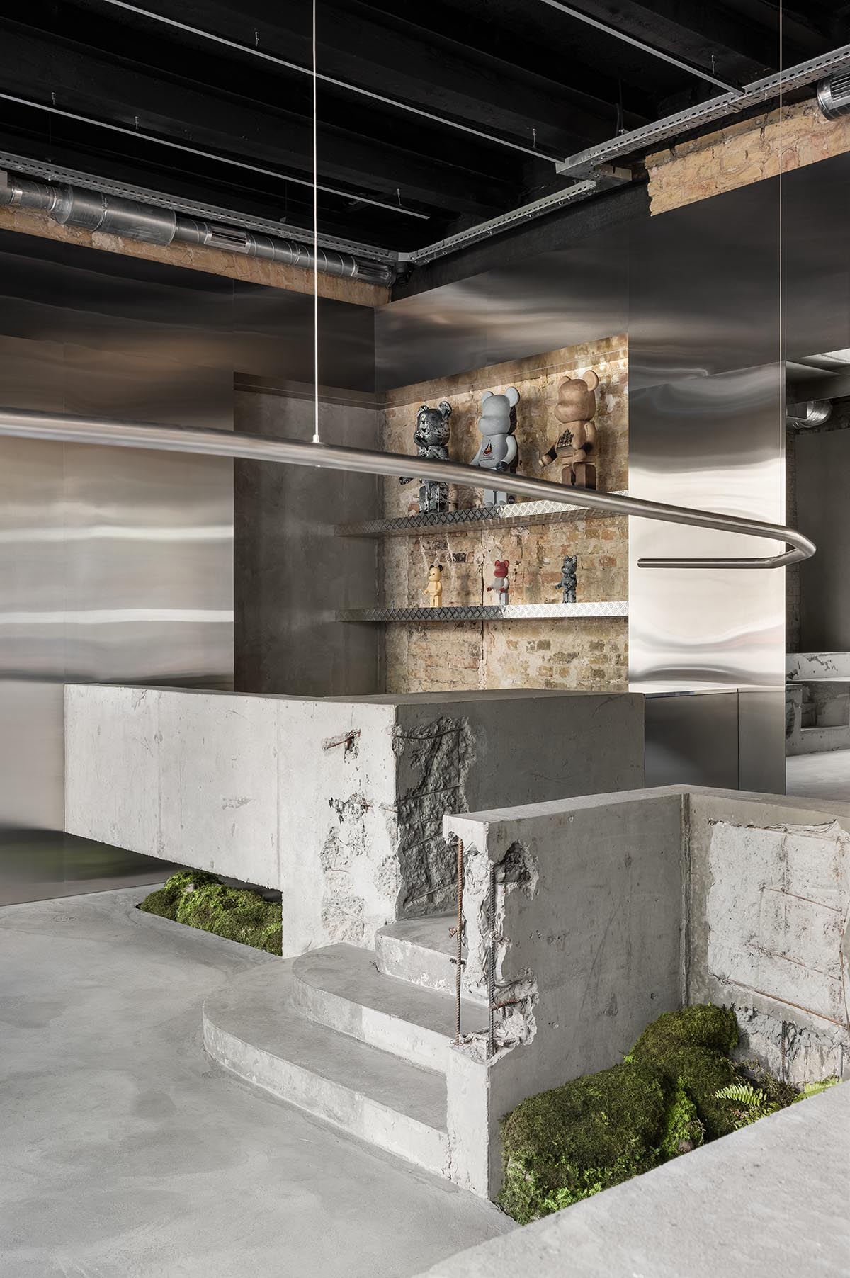 An early 20th-century building is transformed into a raw, industrial-looking interior for Kyiv store 