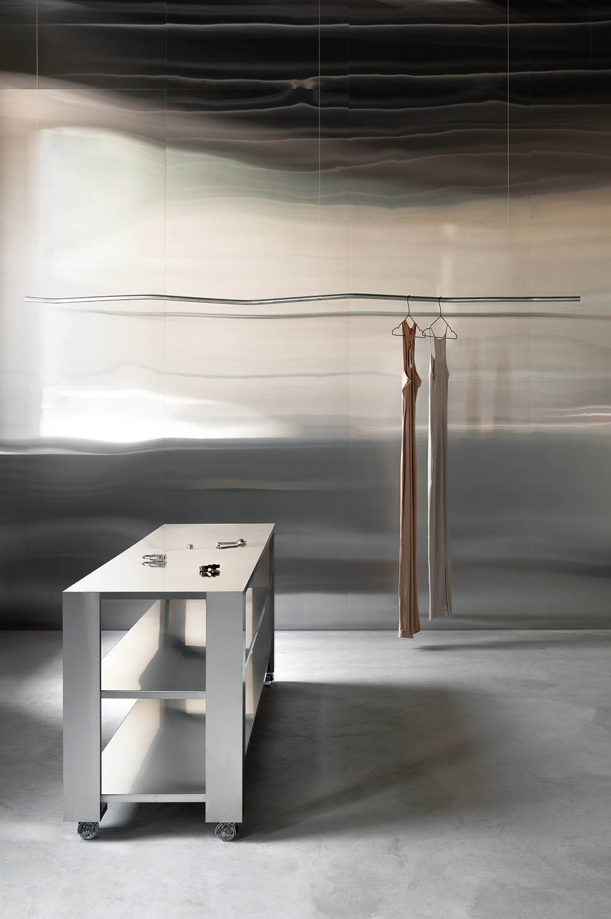 An early 20th-century building is transformed into a raw, industrial-looking interior for Kyiv store 