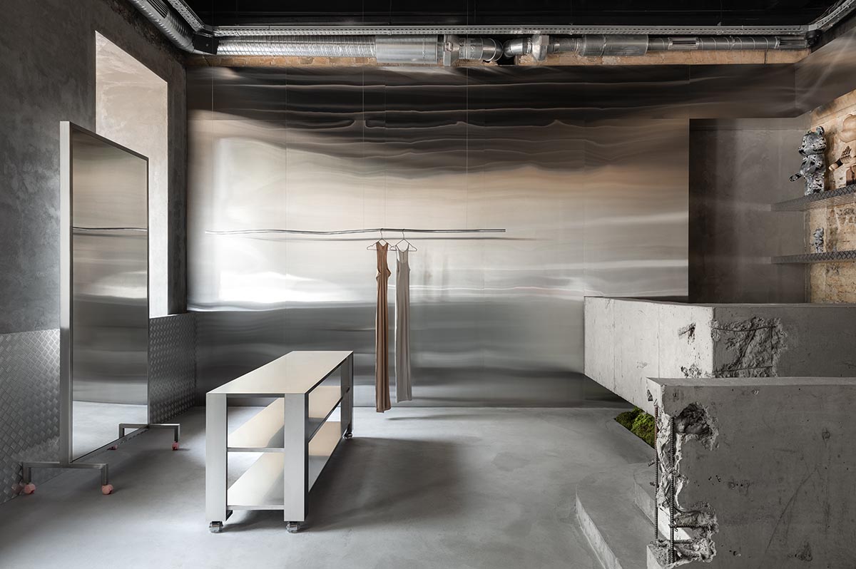 An early 20th-century building is transformed into a raw, industrial-looking interior for Kyiv store 