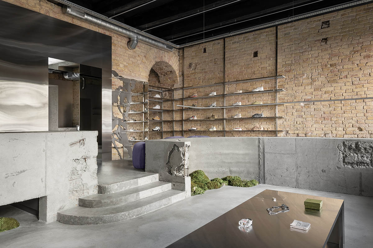 An early 20th-century building is transformed into a raw, industrial-looking interior for Kyiv store 