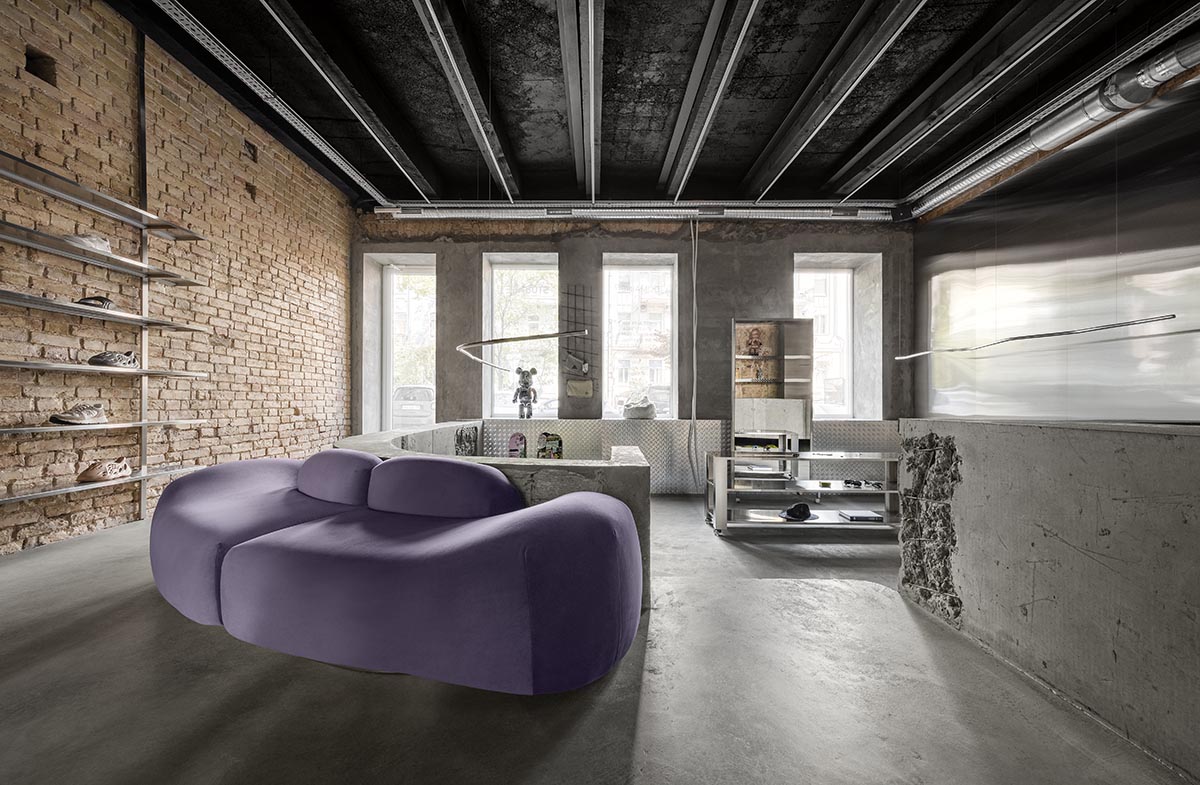An early 20th-century building is transformed into a raw, industrial-looking interior for Kyiv store 