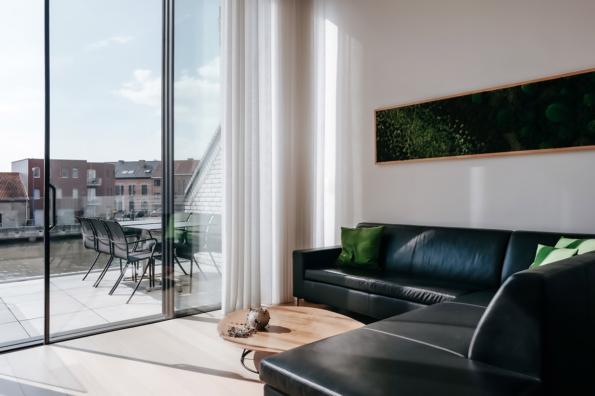 Studio Farris Architects plays with subtraction of volumes to create this residence in Belgian town