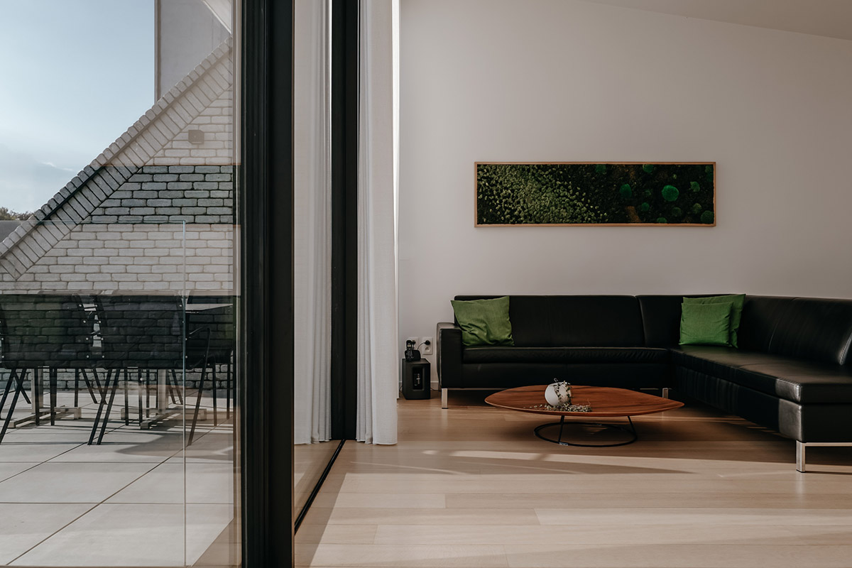 Studio Farris Architects plays with subtraction of volumes to create this residence in Belgian town