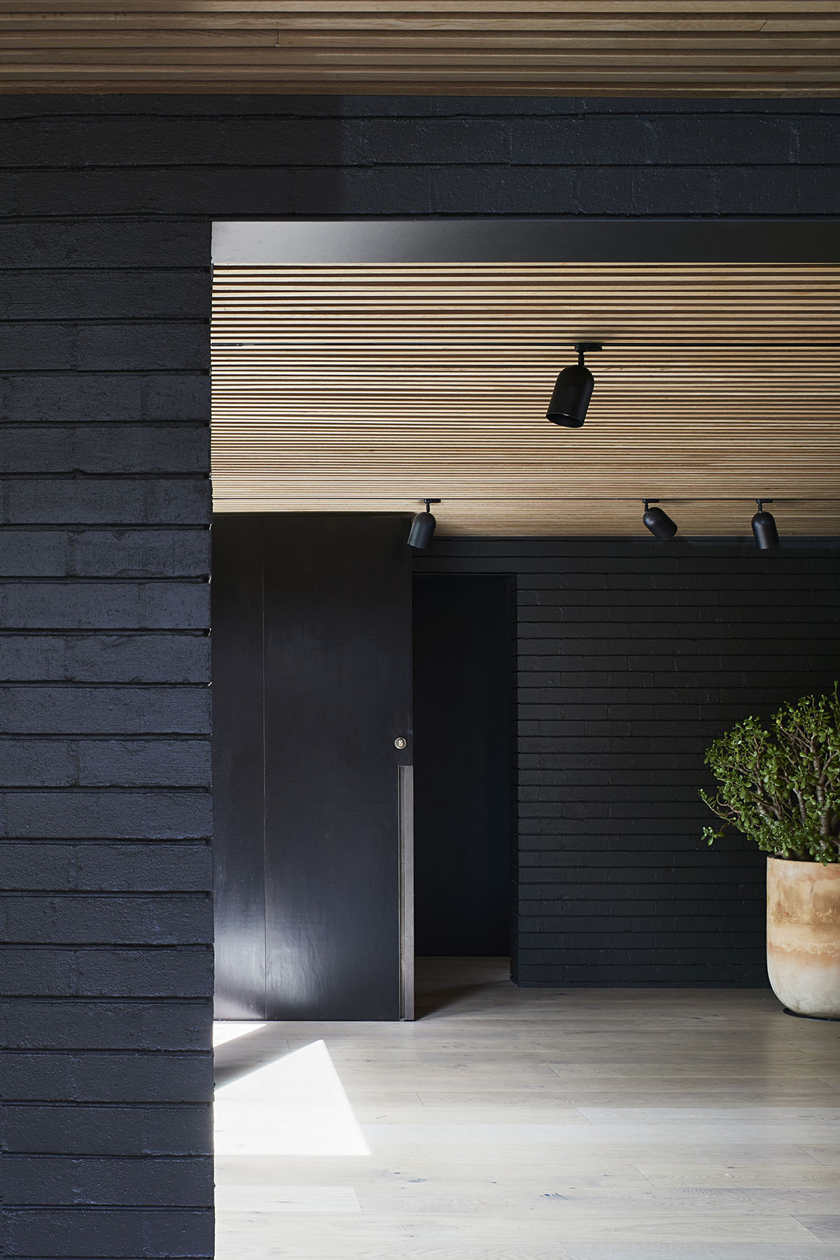 studiofour completes black-colored Central Park Road Residence in Malvern