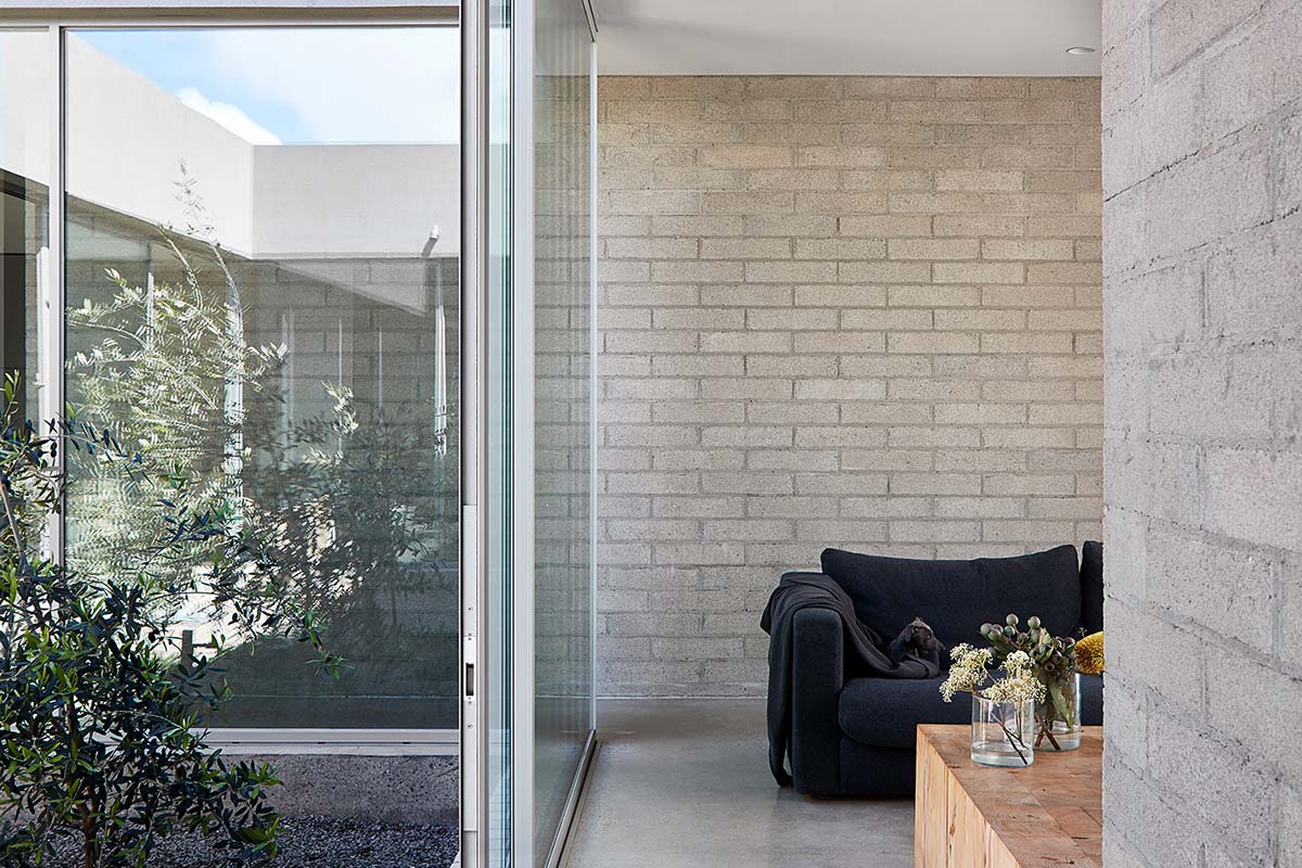 Studio Four designs Ruxton Rise Residence with internal courtyard and minimal elements in Melbourne