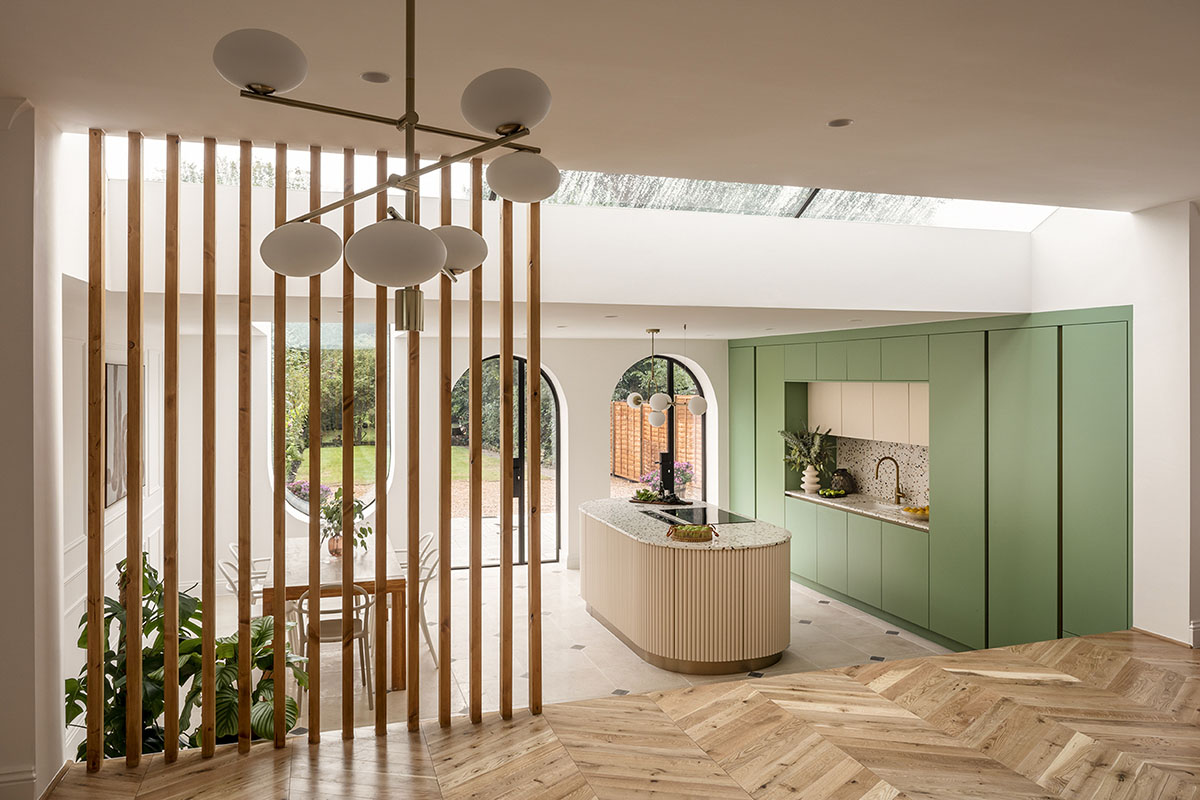 Studio Jayga Architects creates greenish and powder-colored interiors featuring arched doors in Essex