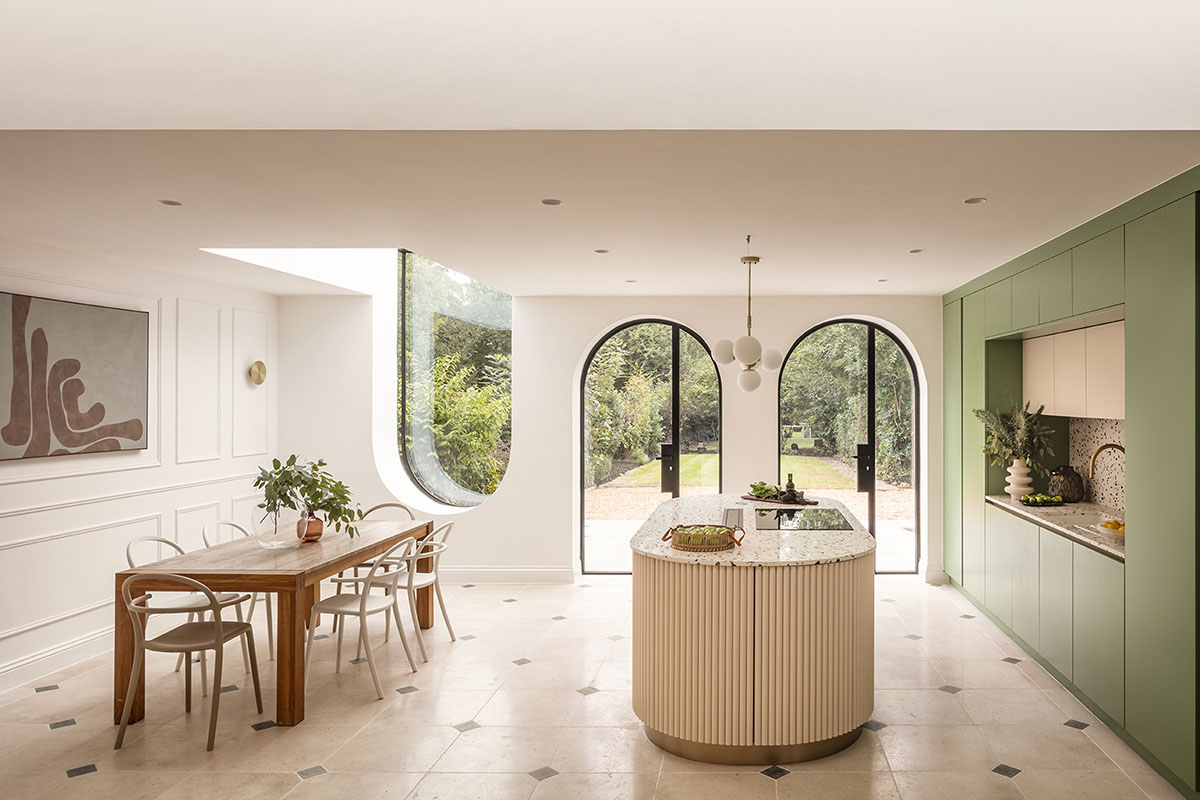 Studio Jayga Architects creates greenish and powder-colored interiors featuring arched doors in Essex