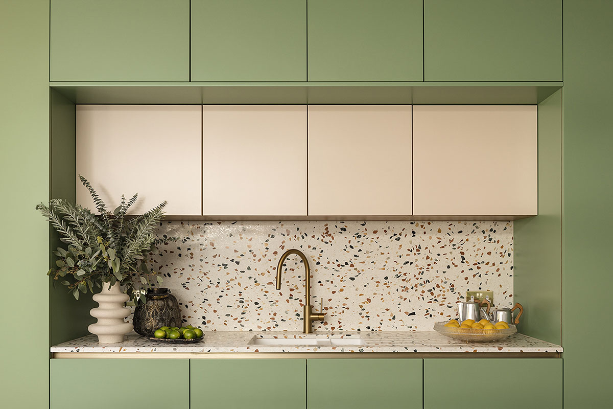 Studio Jayga Architects creates greenish and powder-colored interiors featuring arched doors in Essex