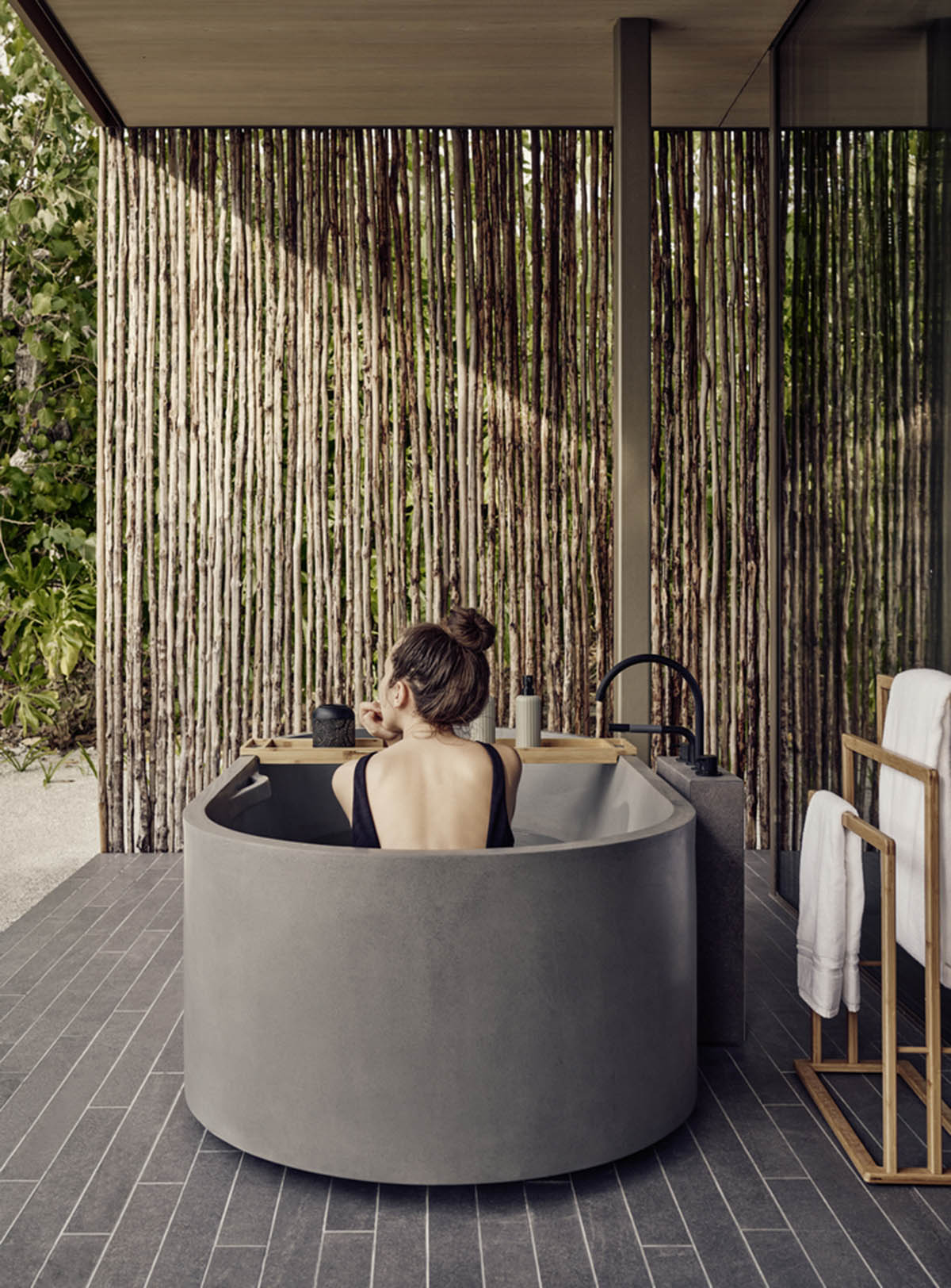 Studio MK27 completes Patina Maldives Hotel with earth-toned palette disappearing in sand