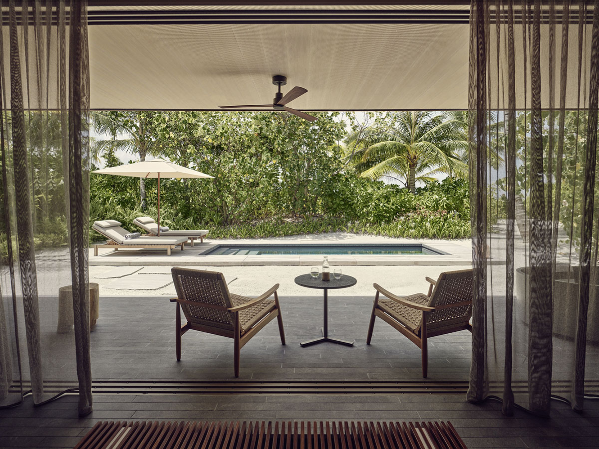 Studio MK27 completes Patina Maldives Hotel with earth-toned palette disappearing in sand