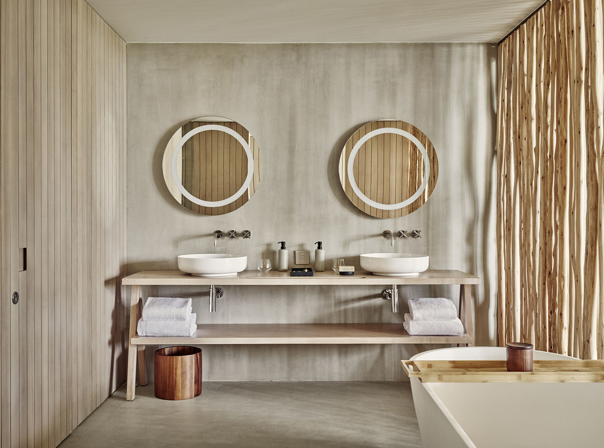 Studio MK27 completes Patina Maldives Hotel with earth-toned palette disappearing in sand