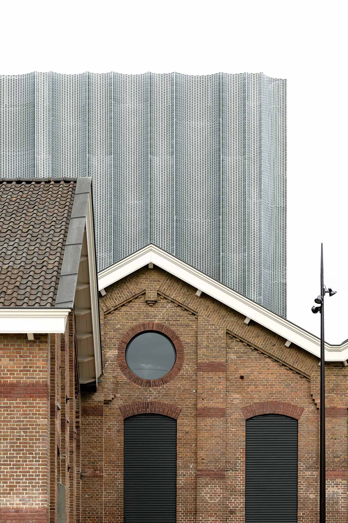 Studioninedots completes transformation of former Dutch Railways workshop building in Utrecht