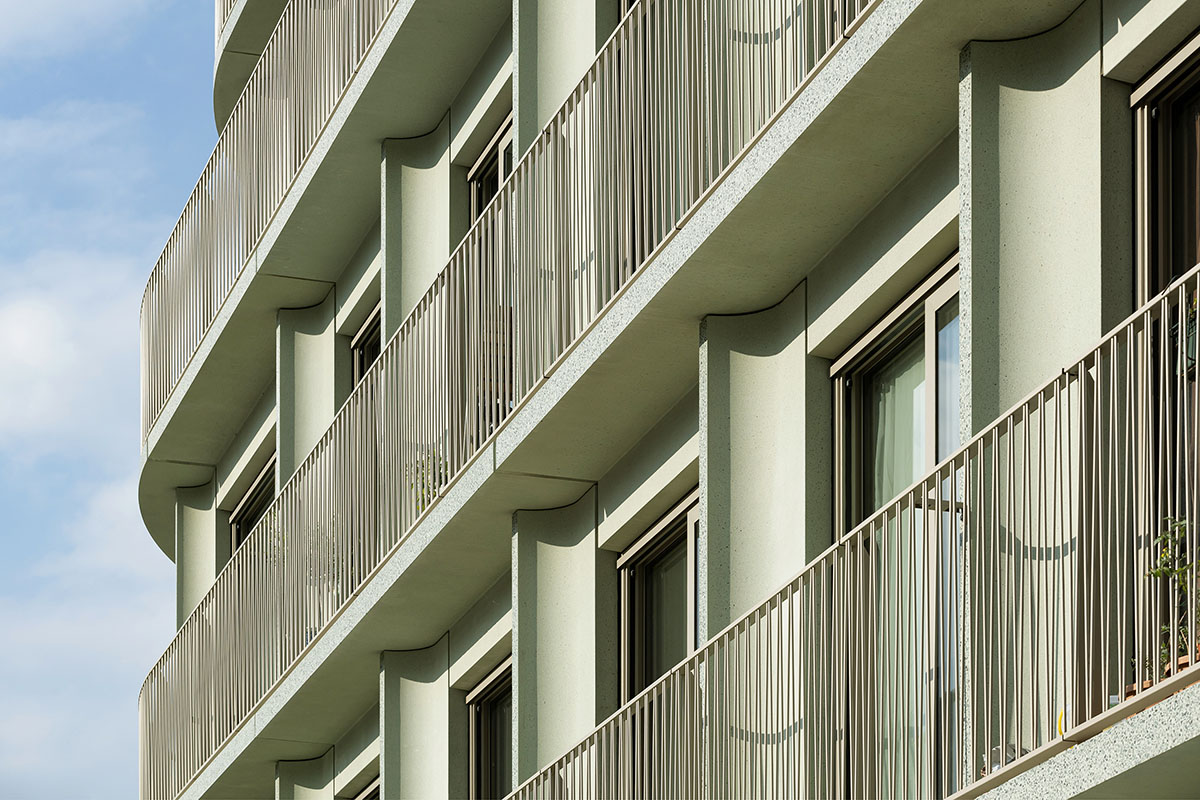 Studioninedots completes social housing featuring staggered balconies in Amsterdam waterfront