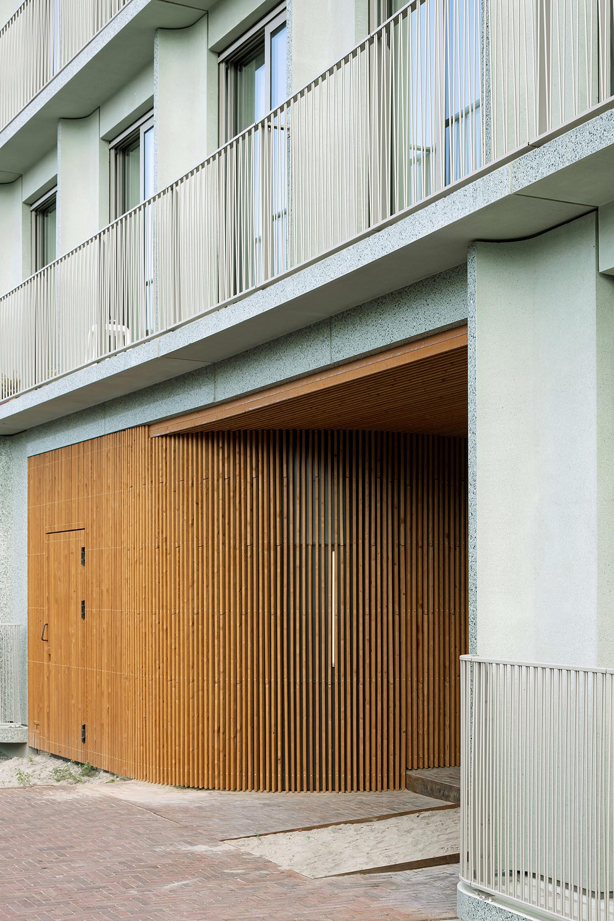Studioninedots completes social housing featuring staggered balconies in Amsterdam waterfront