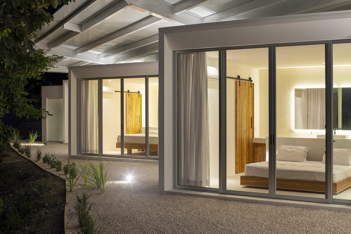 Large wing-like roof points out Santiago Hills Villa designed by Studio Saxe in Costa Rican jungle