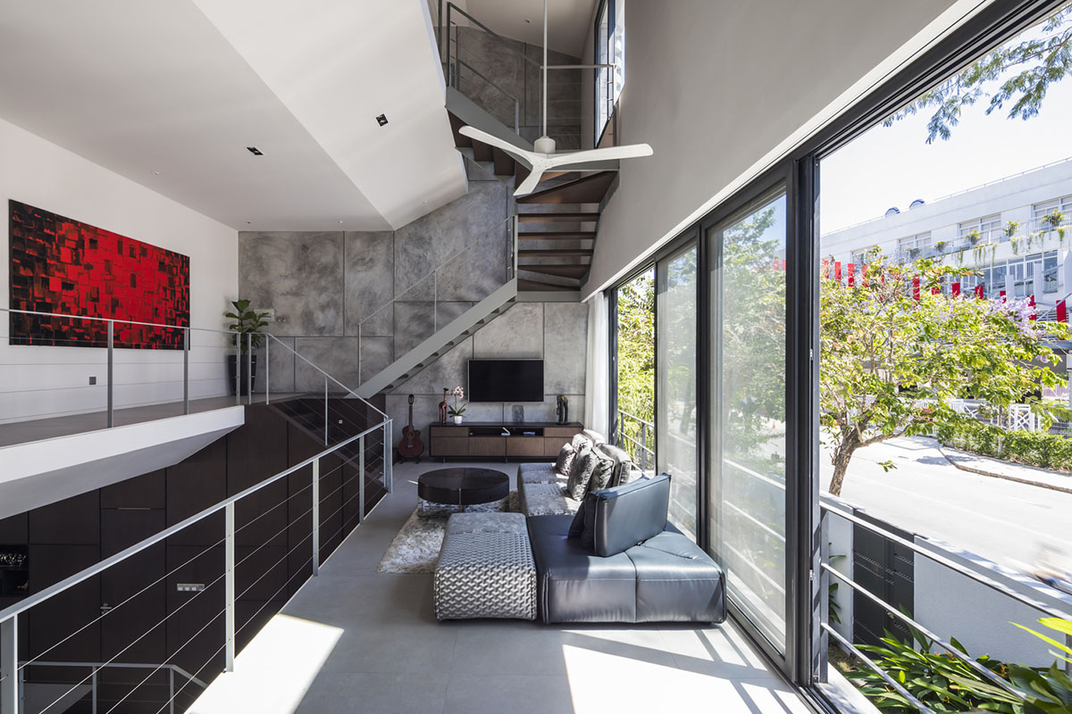 Nha Dan Architects built this house with porous facade to provide maximum thermal comfort in Vietnam