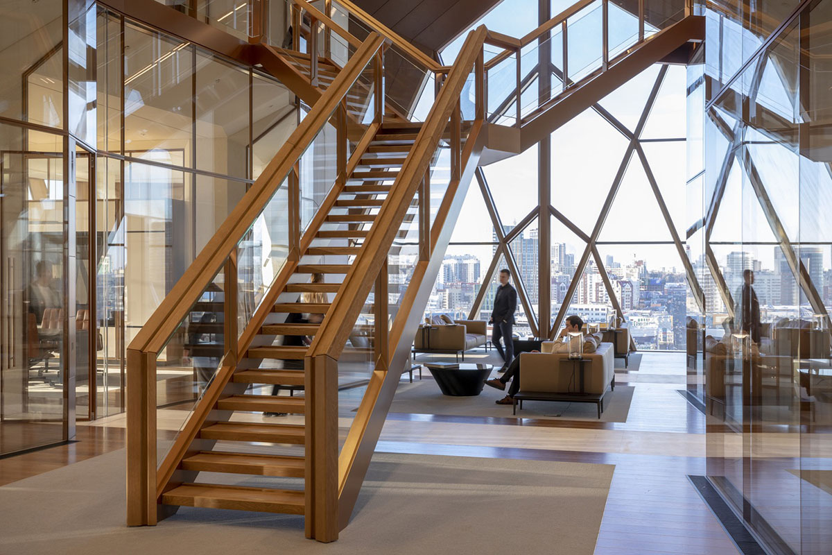 Foster + Partners completes office tower clad by triangular pieces of copper in Yekaterinburg