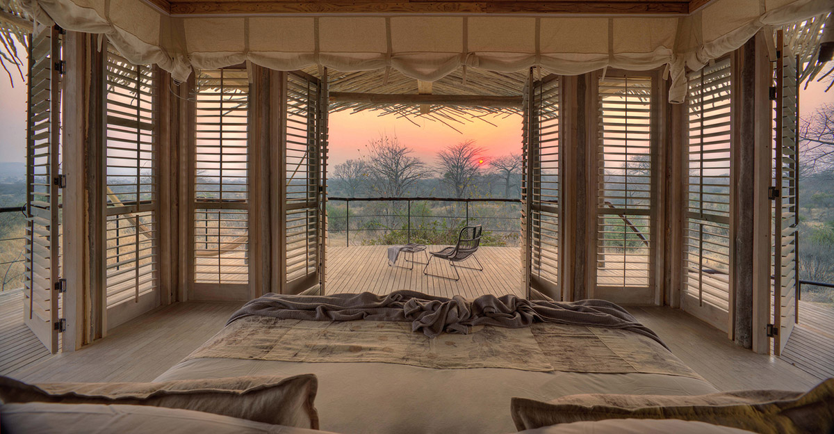 A holiday lodge grows out from natural foundation with permeable skin in Tanzania