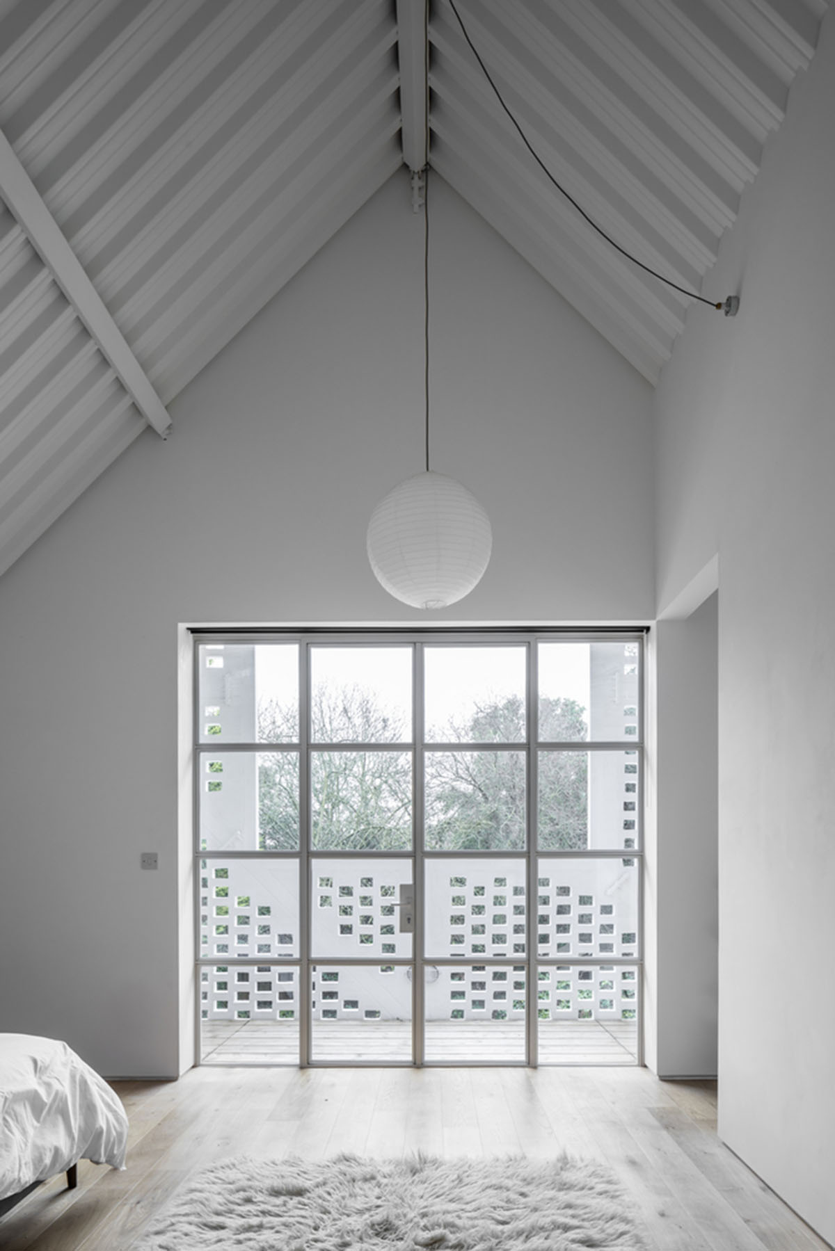 Surman Weston's detached house with porous screen addresses to vernacular architecture in Surrey