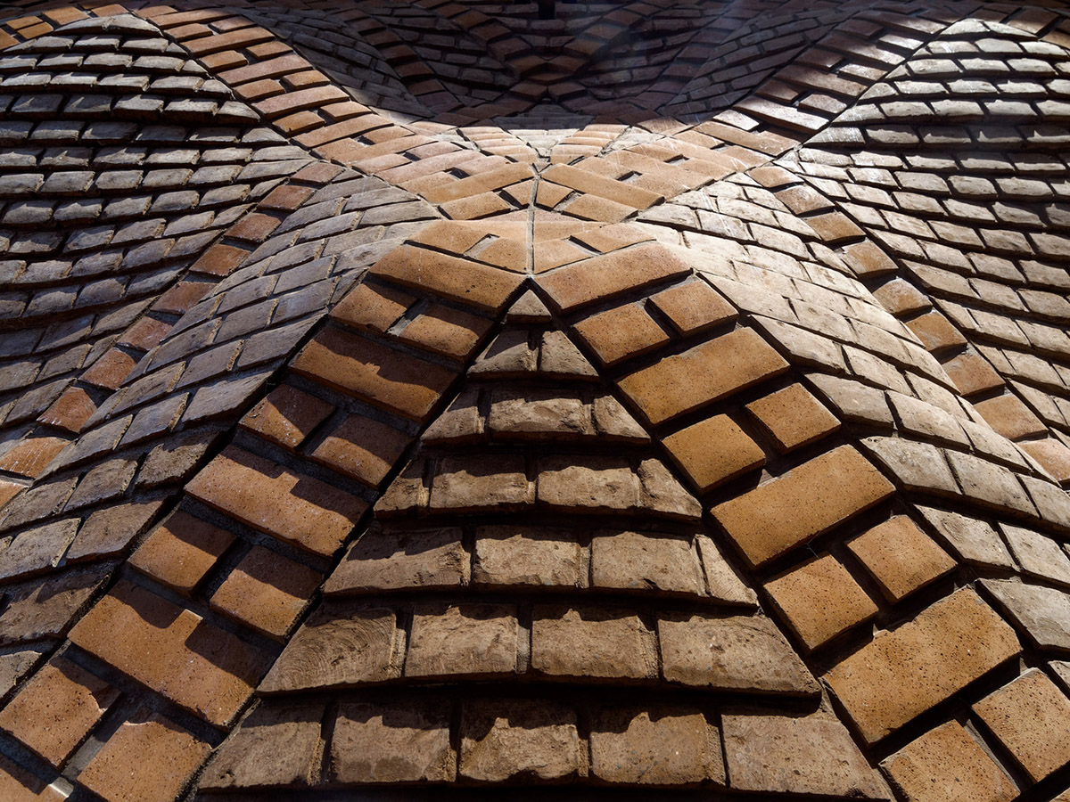 PMA madhushala's community center features undulating and artistic brick walls in Pune