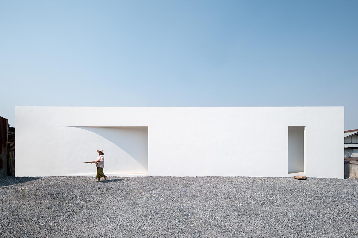 Tantai Architects imagines this house as a white box dancing with light and wind in Thailand
