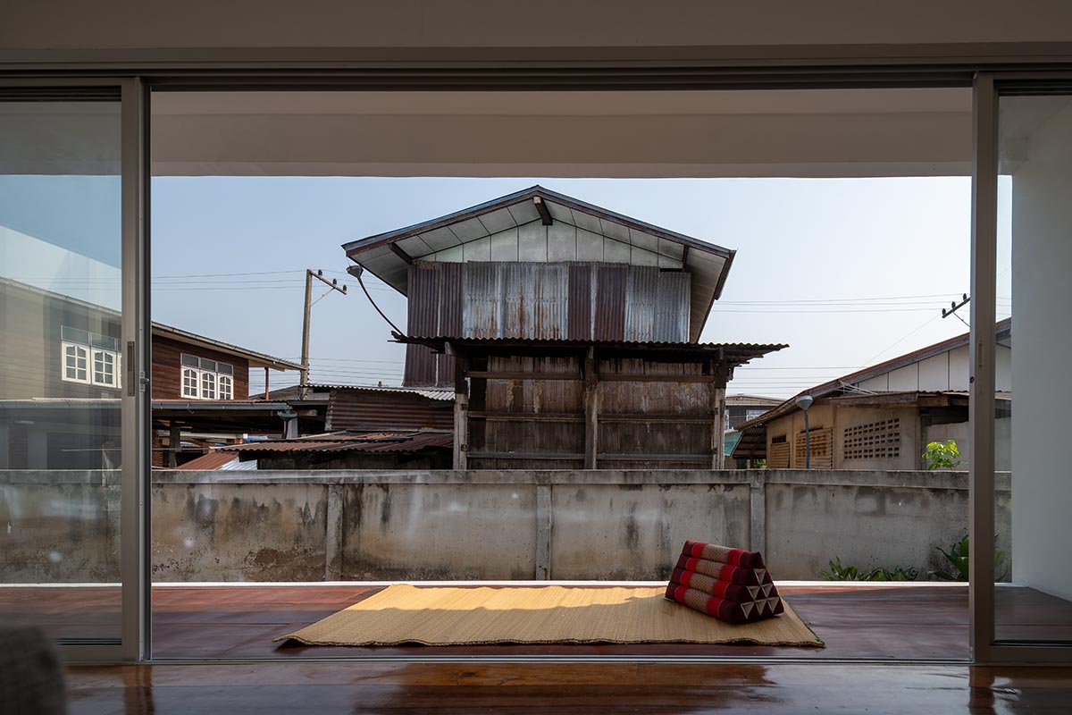 Tantai Architects imagines this house as a white box dancing with light and wind in Thailand 