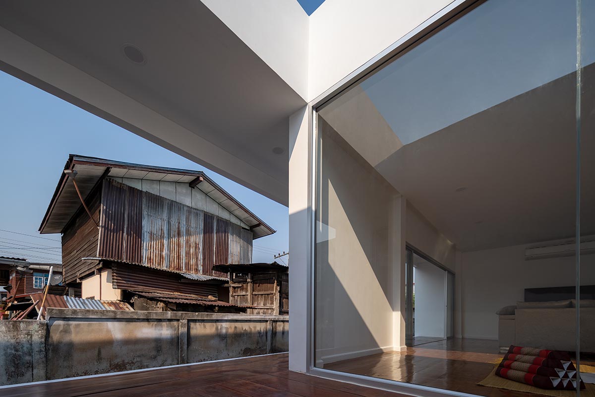 Tantai Architects imagines this house as a white box dancing with light and wind in Thailand 