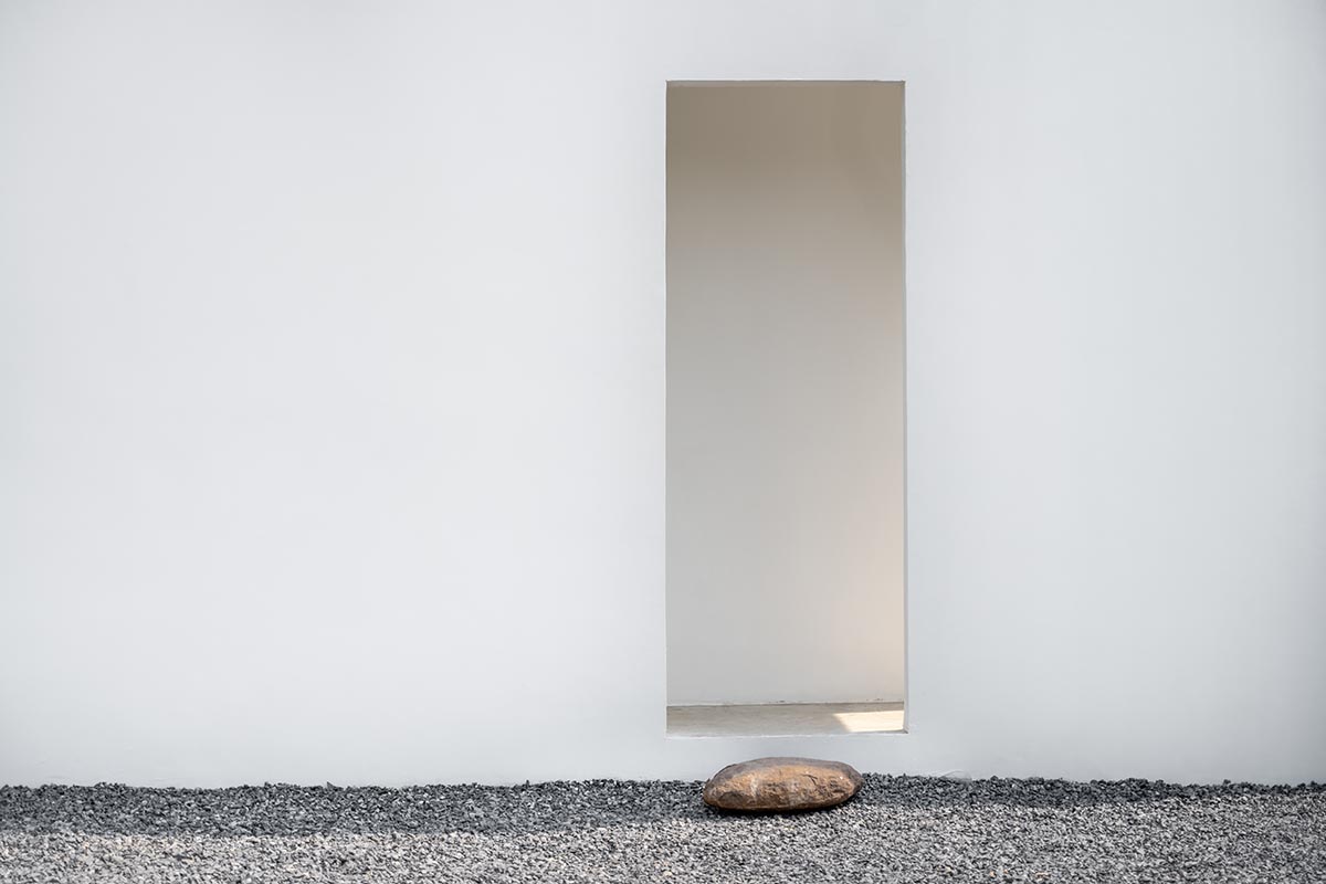 Tantai Architects imagines this house as a white box dancing with light and wind in Thailand 