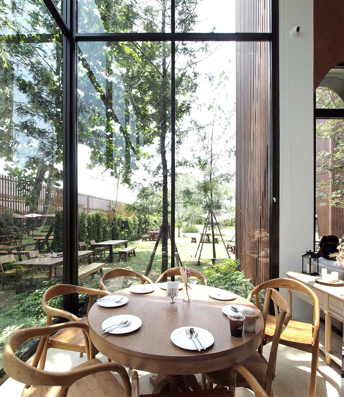 Onion's solid ash and plywood restaurant interior in Bangkok