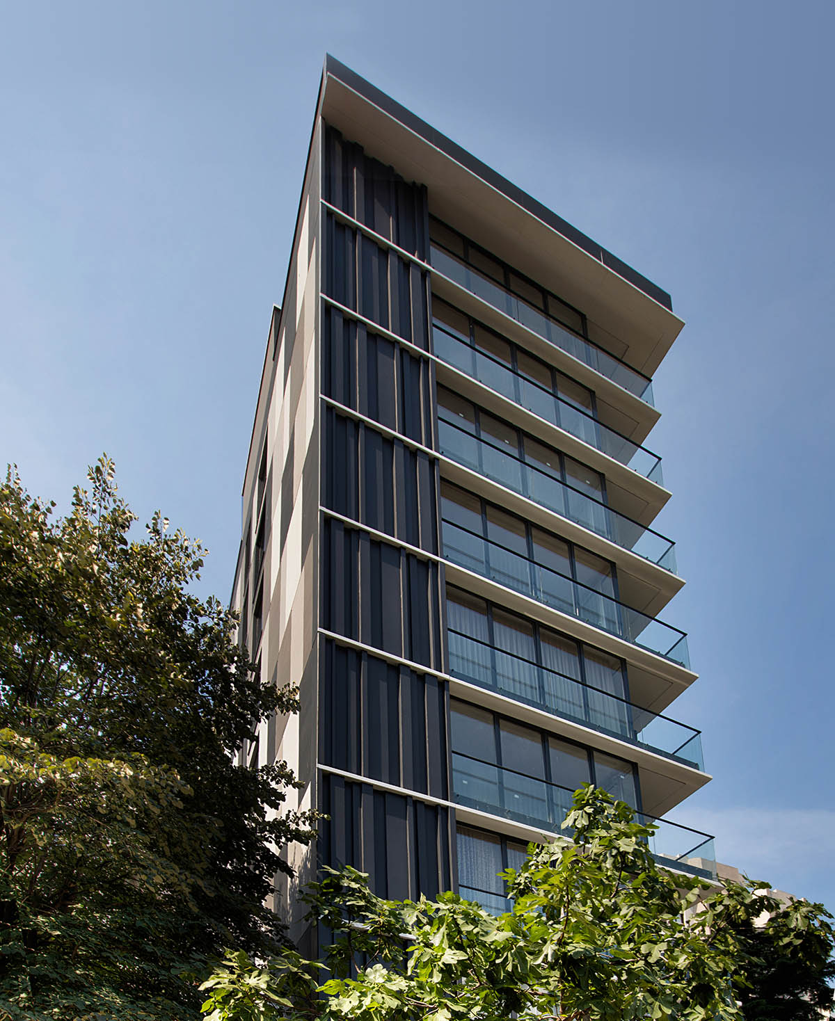 TAGO Architects creates urban industrial effect in Boutique Maya Residence