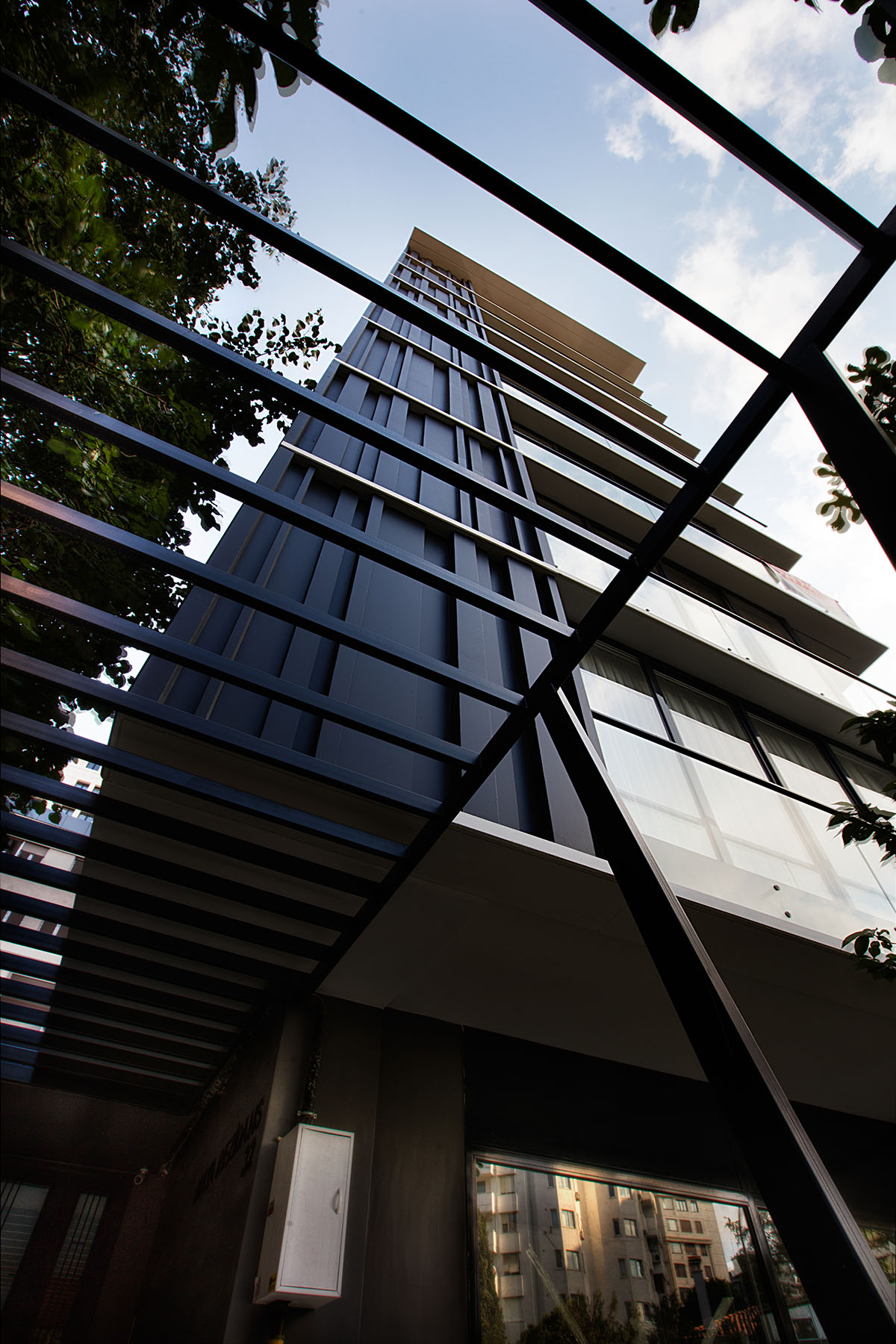 TAGO Architects creates urban industrial effect in Boutique Maya Residence