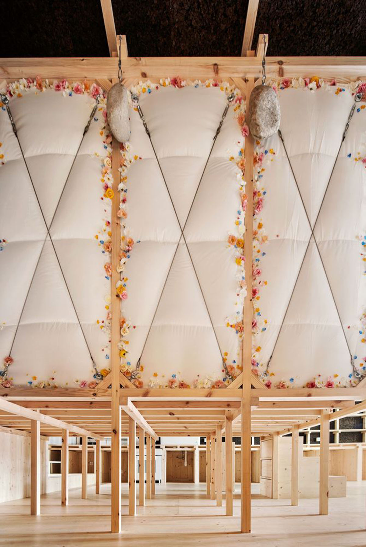 Takk renovates interior of a house in Madrid with wood and natural cork for energy efficiency