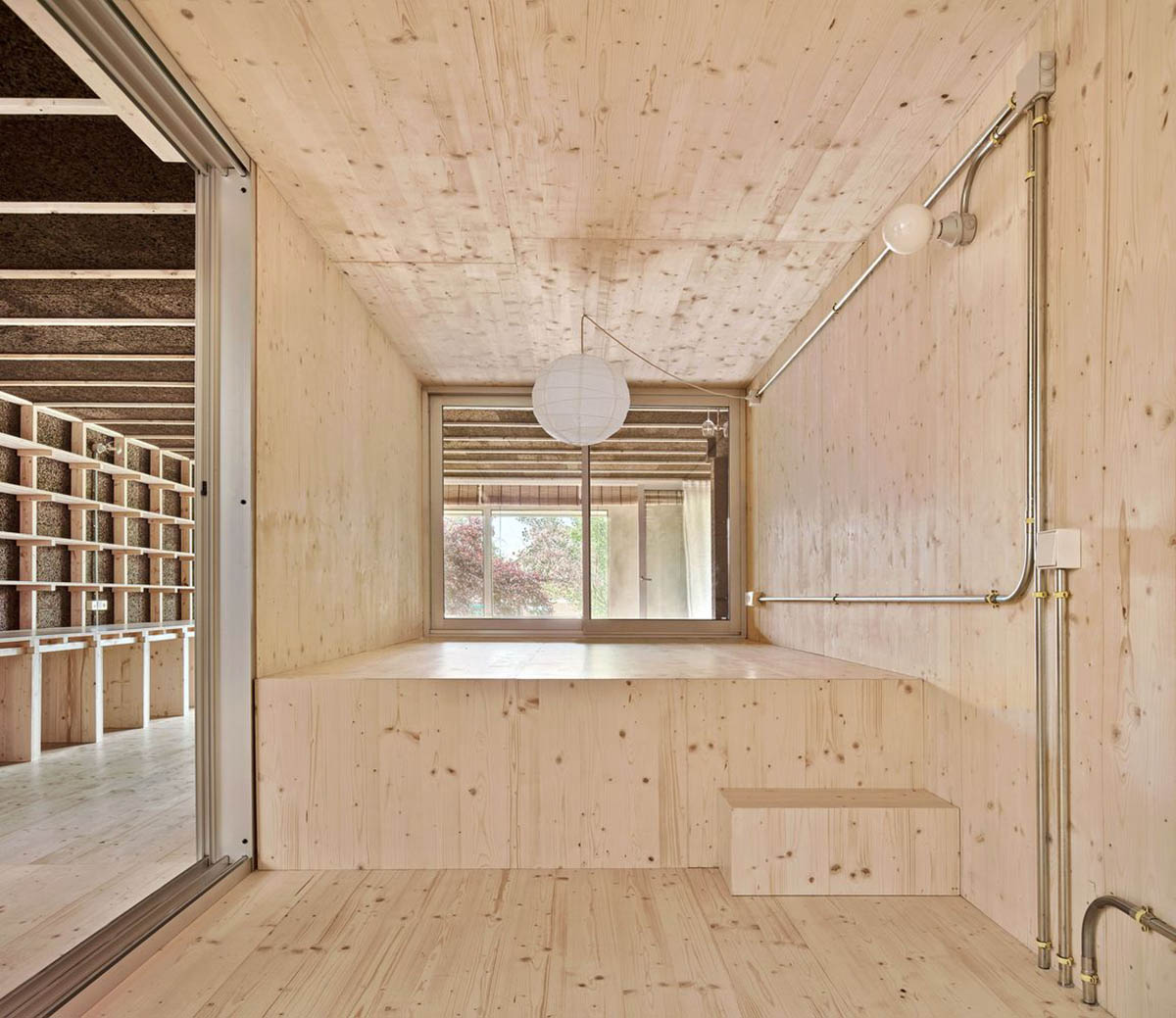 Takk renovates interior of a house in Madrid with wood and natural cork for energy efficiency